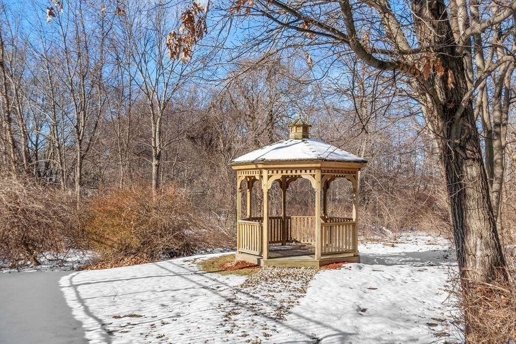 190 Chickering Road, Unit 208D North Andover, MA 01845 - Photo 33 of 42 a front view of a house with a yard