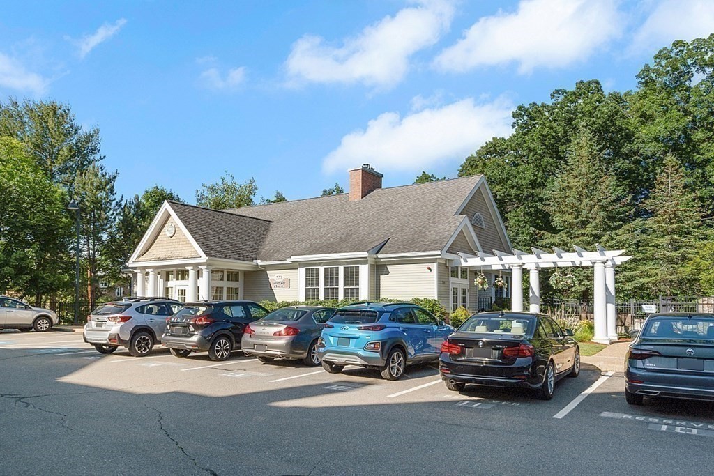 190 Chickering Road, Unit 208D North Andover, MA 01845 - Photo 34 of 42 a car parked in front of a house
