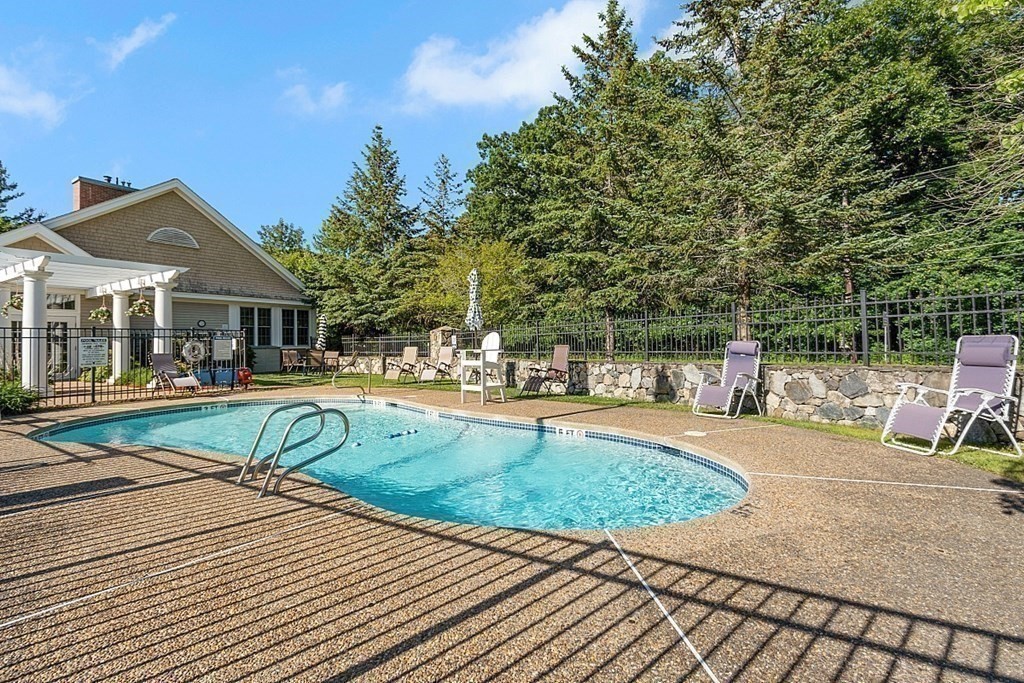 190 Chickering Road, Unit 208D North Andover, MA 01845 - Photo 35 of 42 a view of a house with swimming pool and sitting area