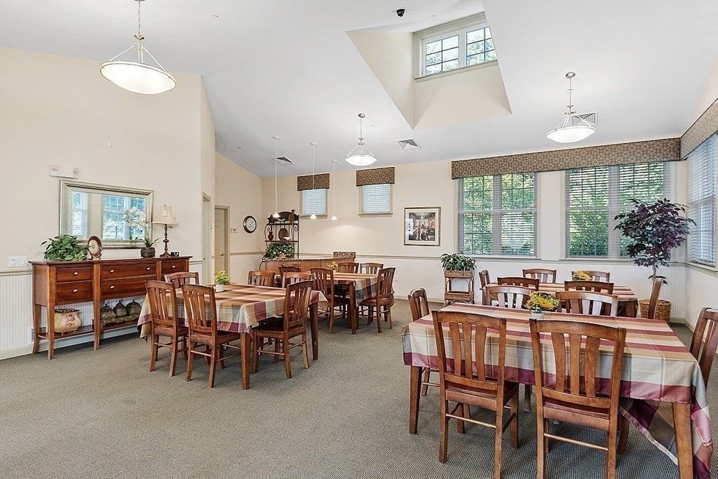 190 Chickering Road, Unit 208D North Andover, MA 01845 - Photo 40 of 42 a view of a dining room with furniture window and outside view