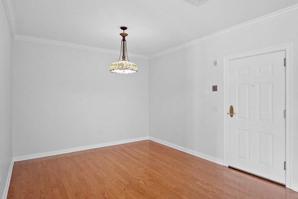 190 Chickering Road, Unit 208D North Andover, MA 01845 - Photo 9 of 42 a view of empty room with a window
