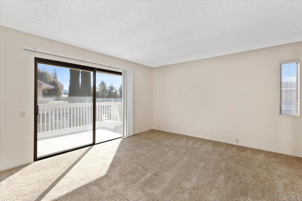 17523 Fairlie Road San Diego, CA 92128 - Photo 22 of 33 a view of an empty room with a window