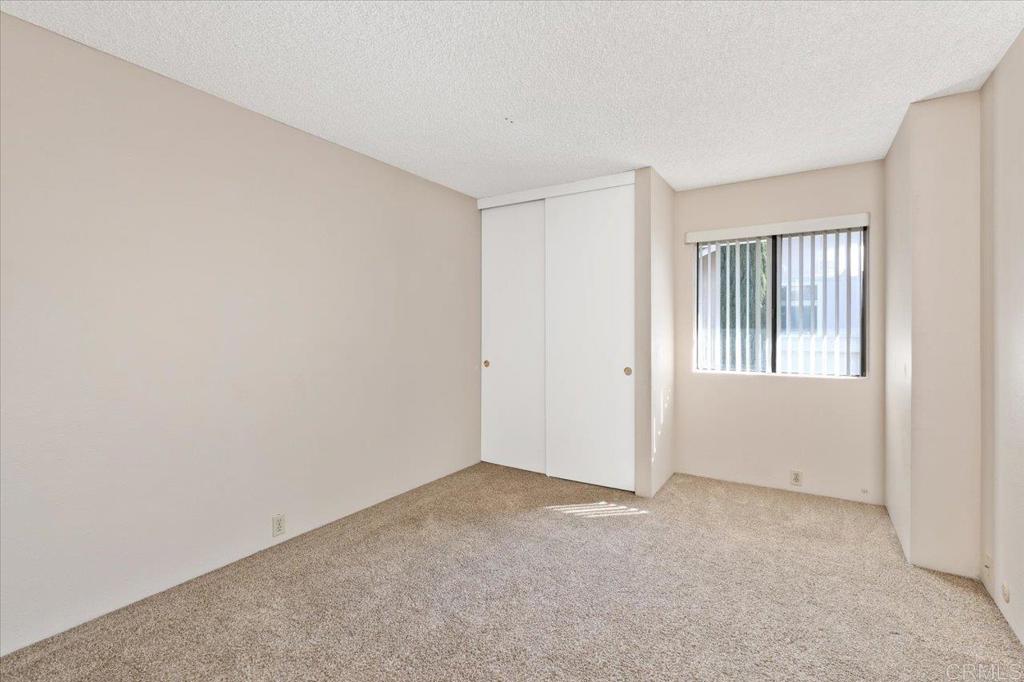 17523 Fairlie Road San Diego, CA 92128 - Photo 29 of 33 an empty room with windows