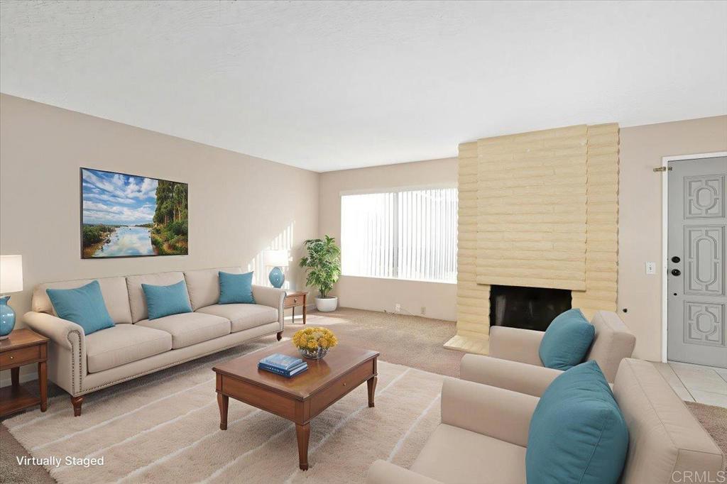 17523 Fairlie Road San Diego, CA 92128 - Photo 5 of 33 a living room with furniture and a fireplace