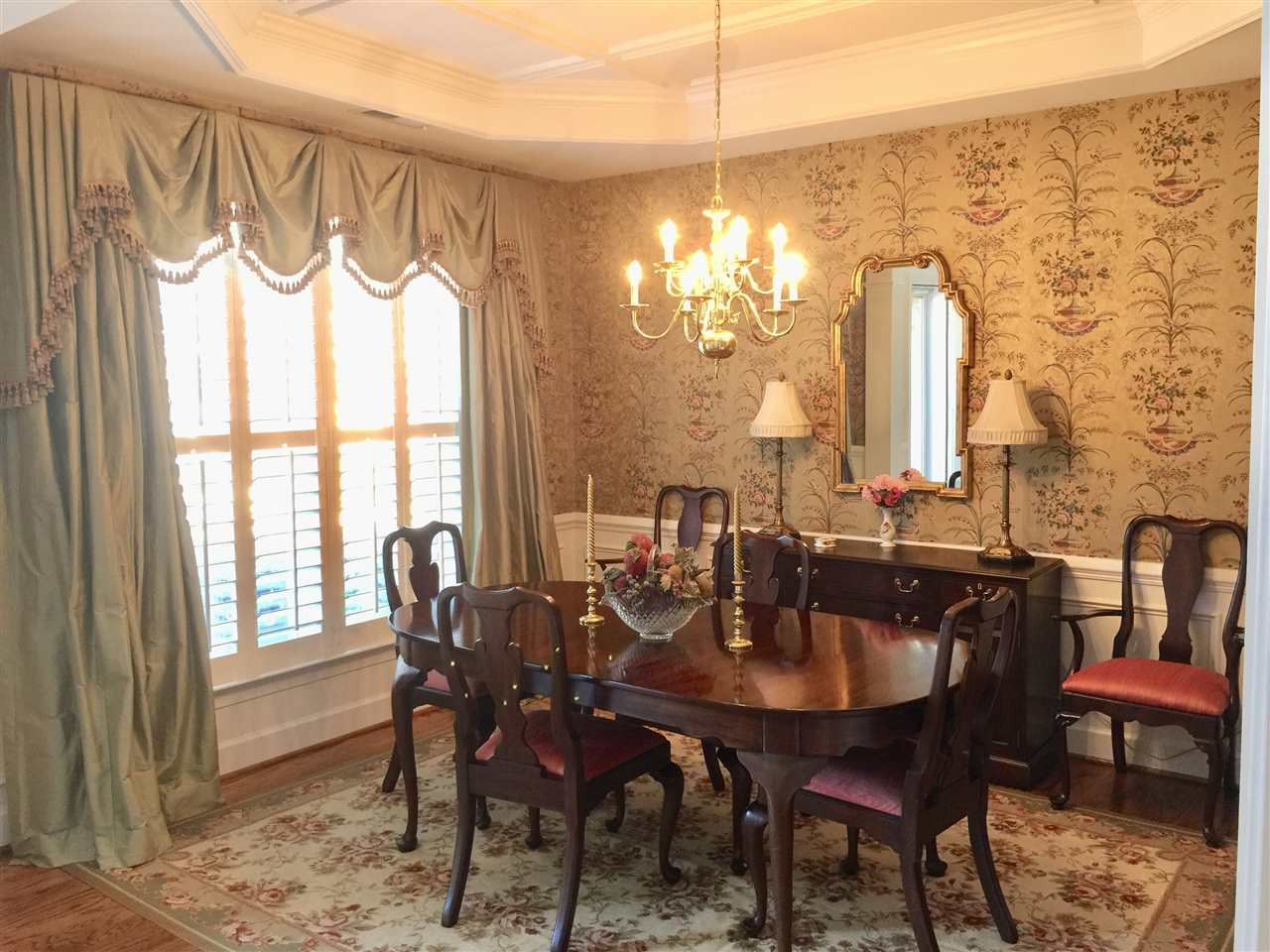 3900 Sunset Maple Court Raleigh, NC 27612 - Photo 2 of 20 Elegant dining room with tray ceiling, hardwood floors + heavy moulding Dining Room