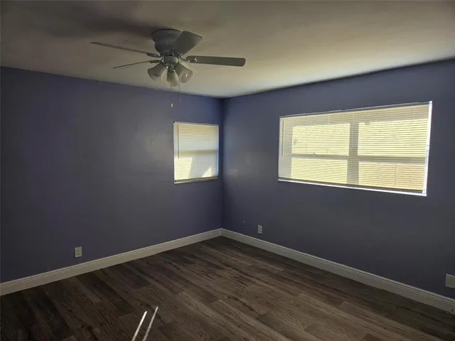 a stove top oven sitting inside of a kitchen