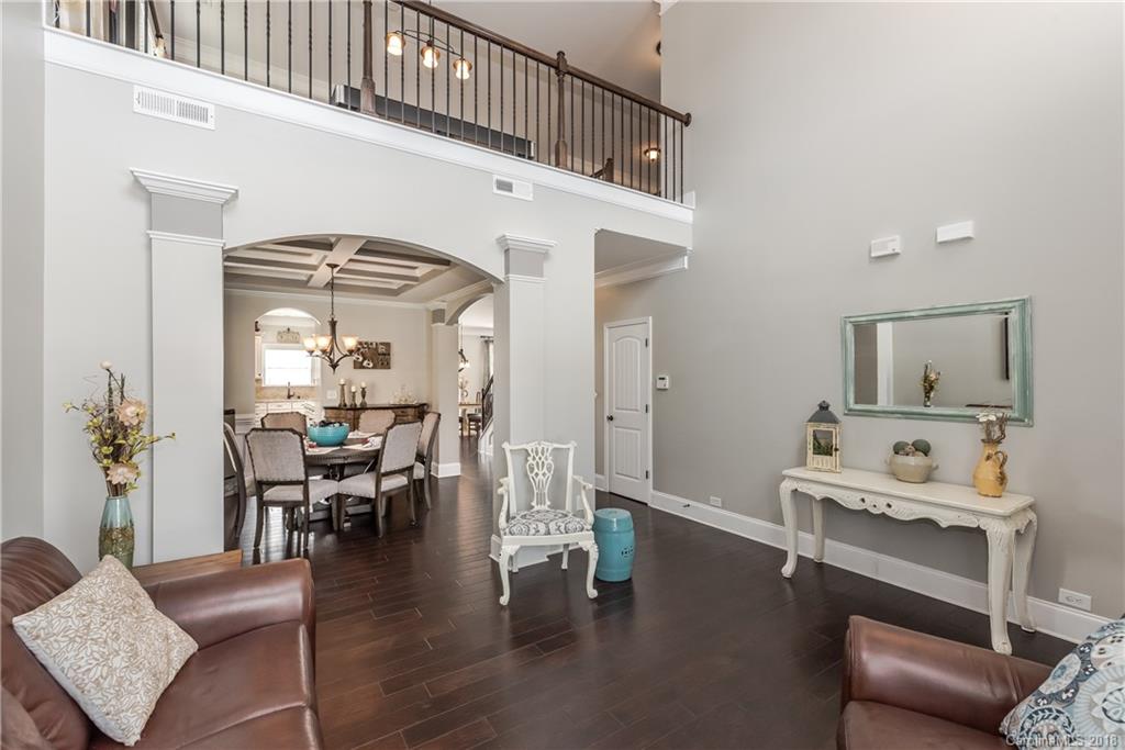 79180 Ridgehaven Road Lancaster, SC 29720 - Photo 3 of 24 a living room with furniture and a chandelier