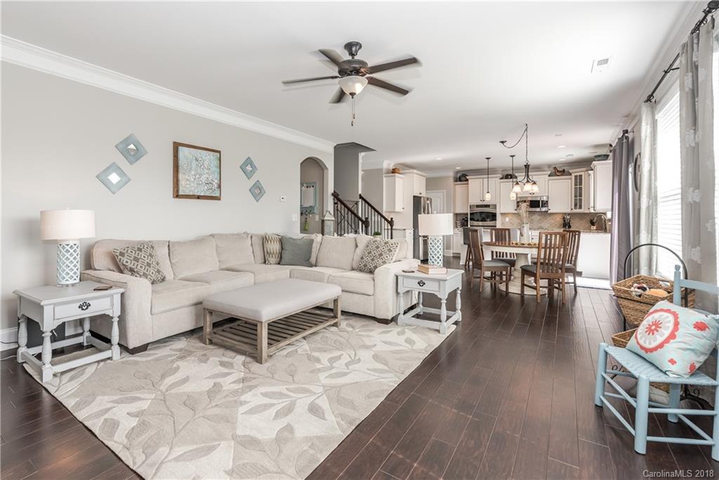 79180 Ridgehaven Road Lancaster, SC 29720 - Photo 9 of 24 a living room with furniture and a chandelier