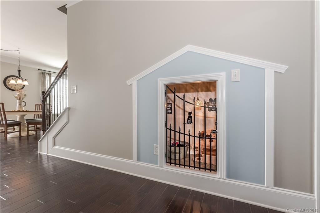 79180 Ridgehaven Road Lancaster, SC 29720 - Photo 10 of 24 an empty room with wooden floor and windows