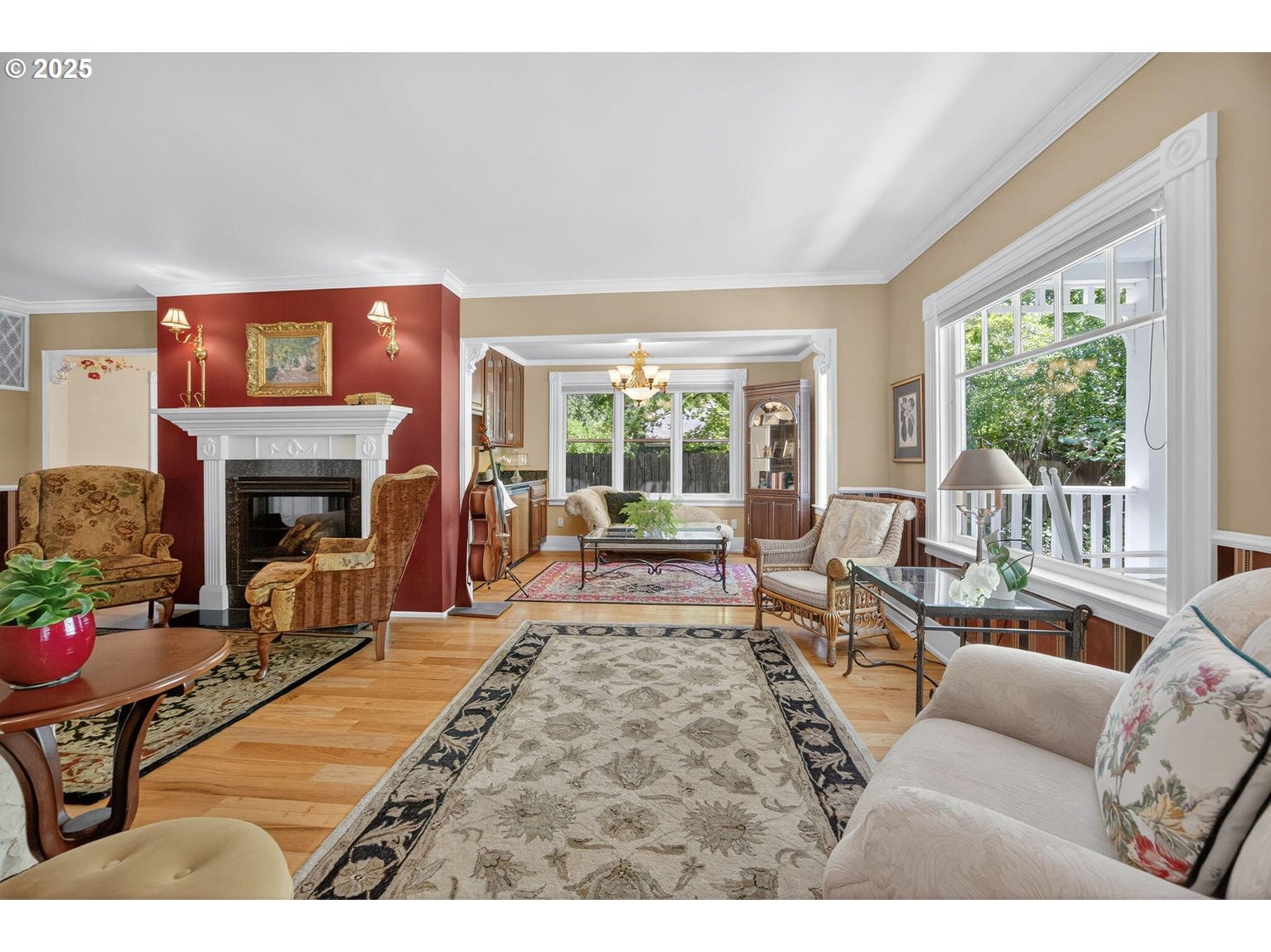496 Beach Street Ashland, OR 97520 - Photo 11 of 45 a living room with furniture a fireplace and a large window