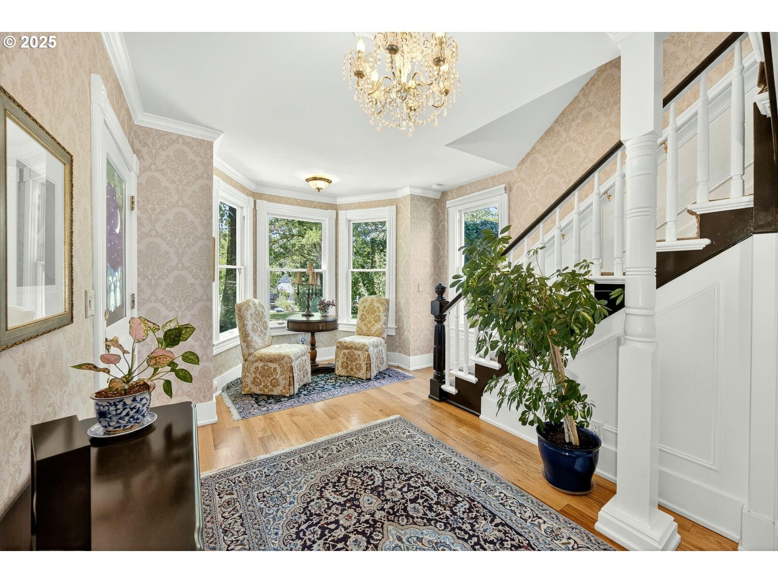 496 Beach Street Ashland, OR 97520 - Photo 6 of 45 a living room with furniture and a chandelier