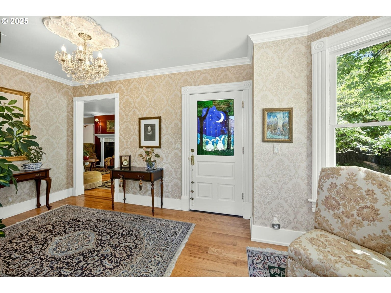 496 Beach Street Ashland, OR 97520 - Photo 7 of 45 a living room with furniture and a chandelier