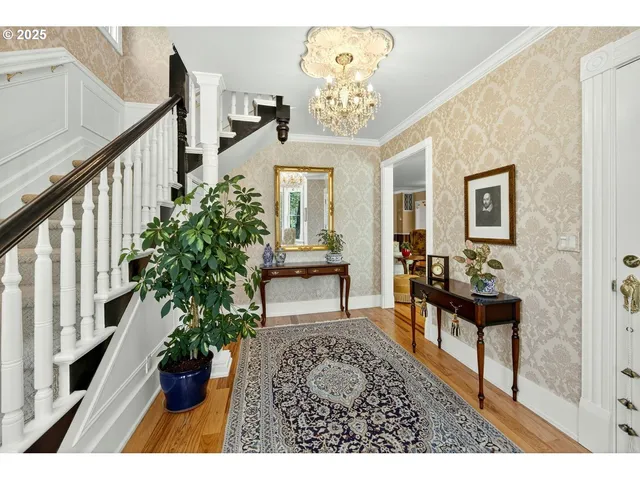 a view of entryway with wooden floor