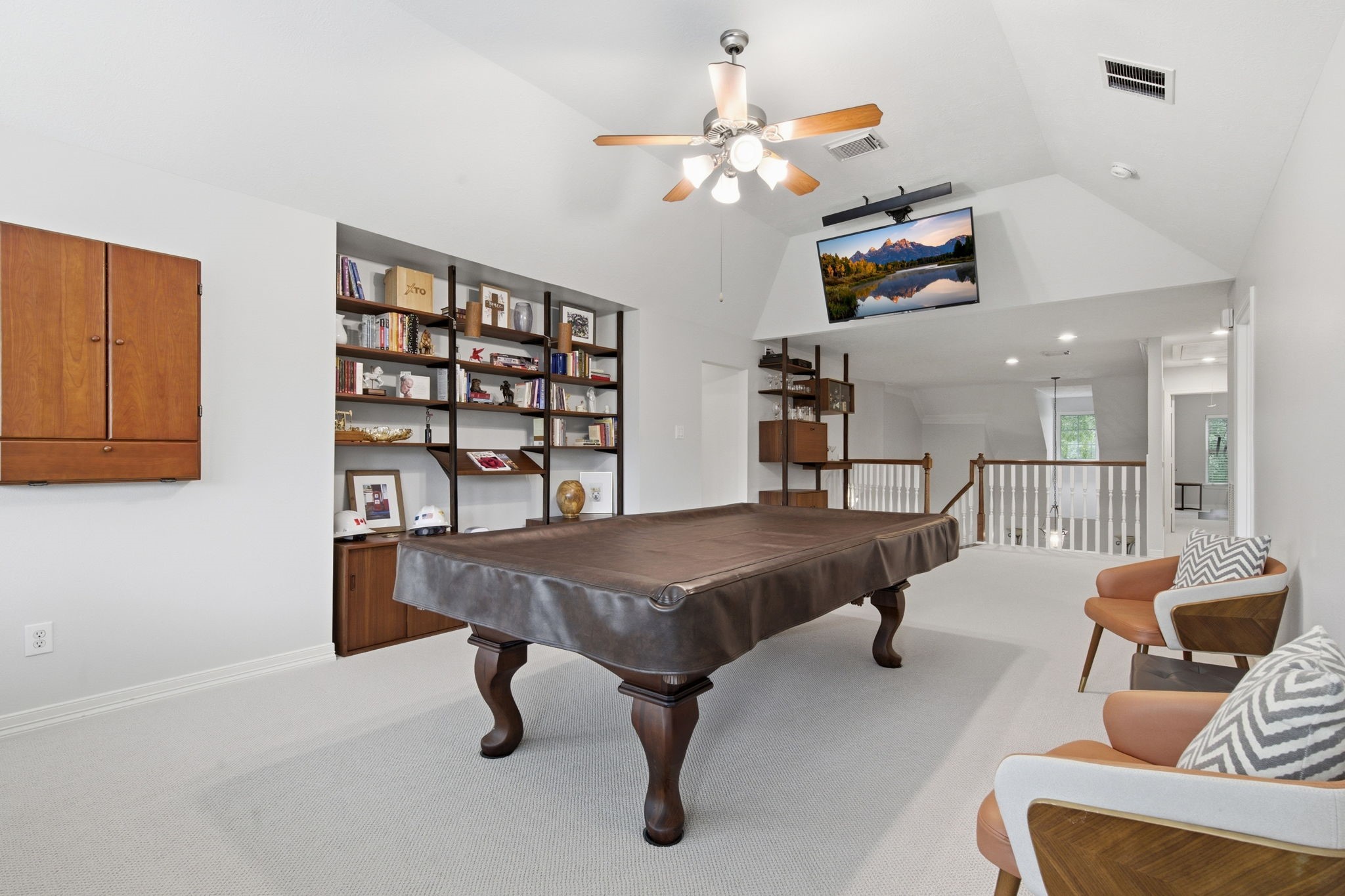 10203 Noble Pointe Court Spring, TX 77379 - Photo 21 of 50 Game room with premium Berber carpet.Upper TV mount