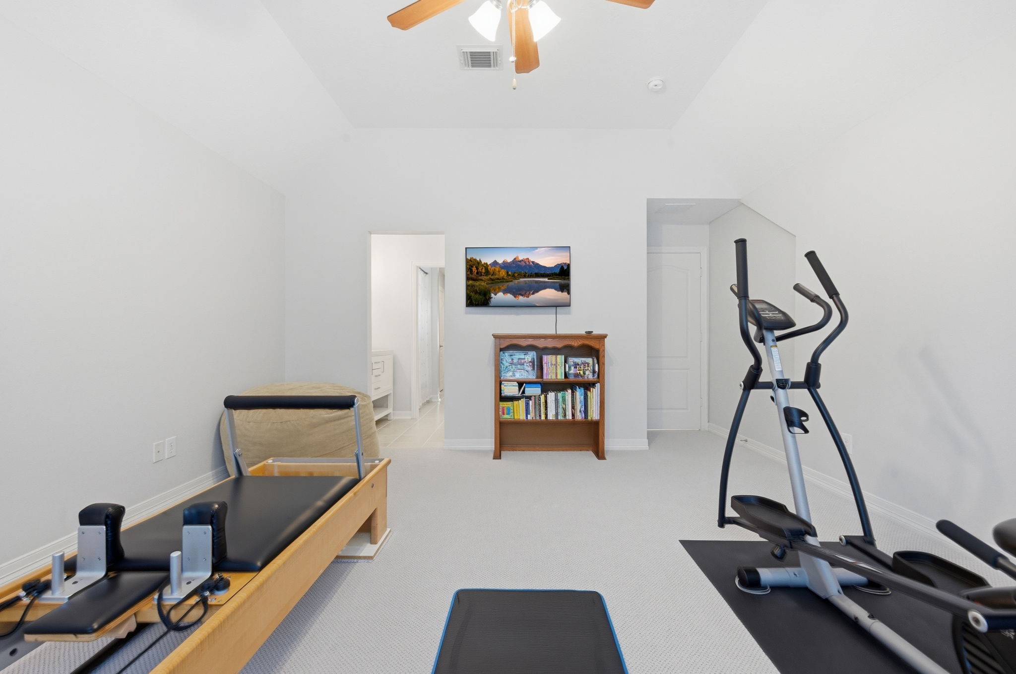 10203 Noble Pointe Court Spring, TX 77379 - Photo 28 of 50 Bedroom 4 being used for exercise area with Jack and Jill