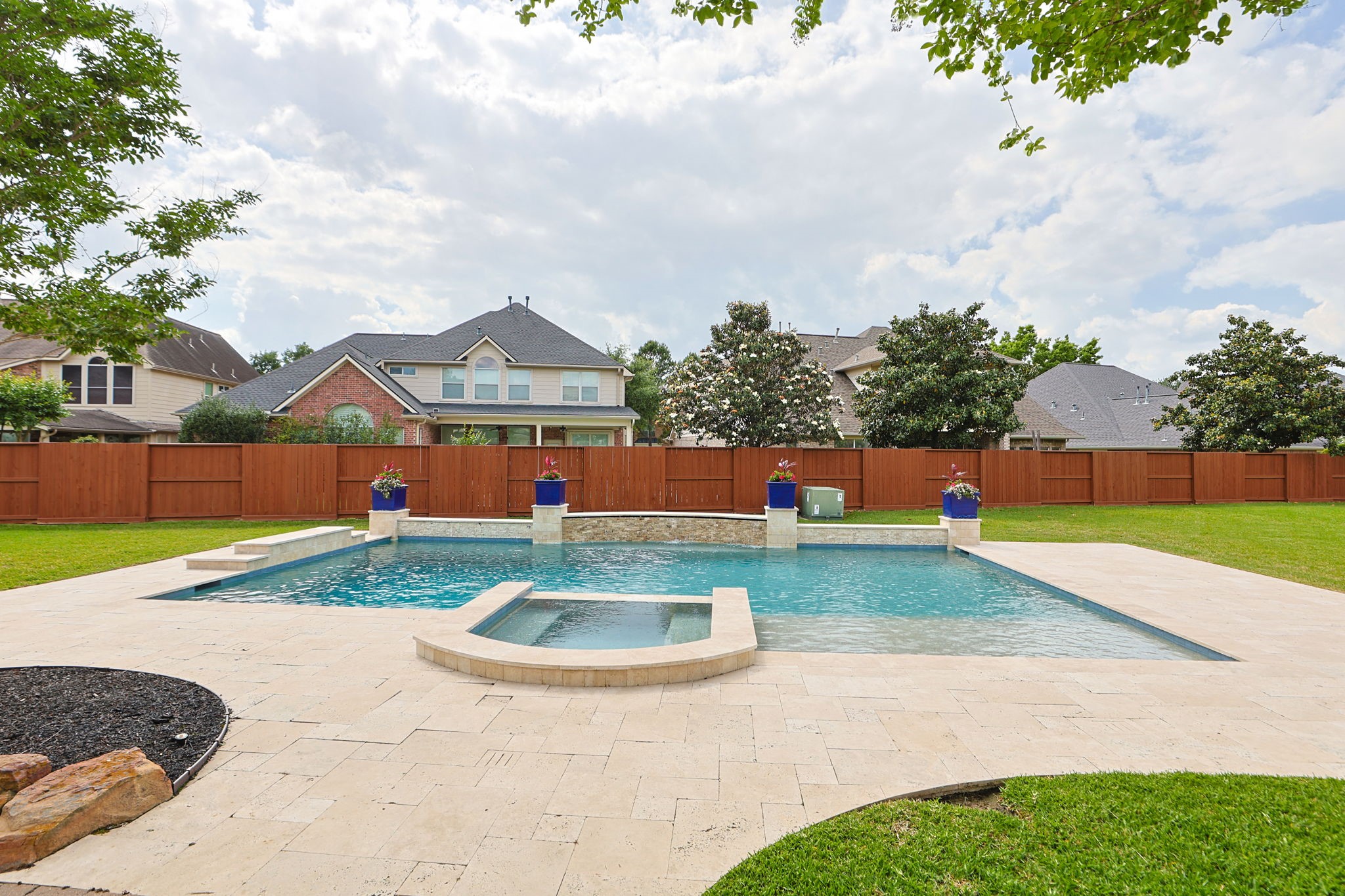 10203 Noble Pointe Court Spring, TX 77379 - Photo 30 of 50 The Ahh... moment. 2022 Pebbletech pool with waterfalls in the up to date style of pools.