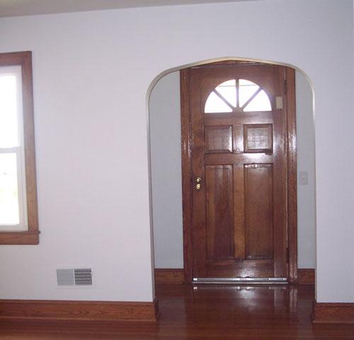 9890 Stewartsville Road Goodview, VA 24095 - Photo 6 of 16 an empty room with wooden floor closet and windows