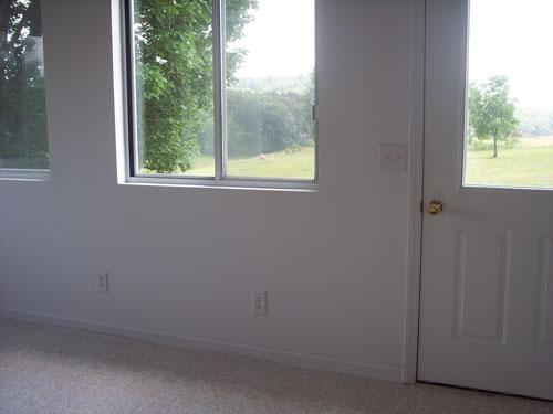 9890 Stewartsville Road Goodview, VA 24095 - Photo 7 of 16 a room that has a window in it