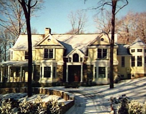 29 Country Club Road Ridgefield, CT 06877 - Photo 1 of 1 a front view of a house with a yard and garage