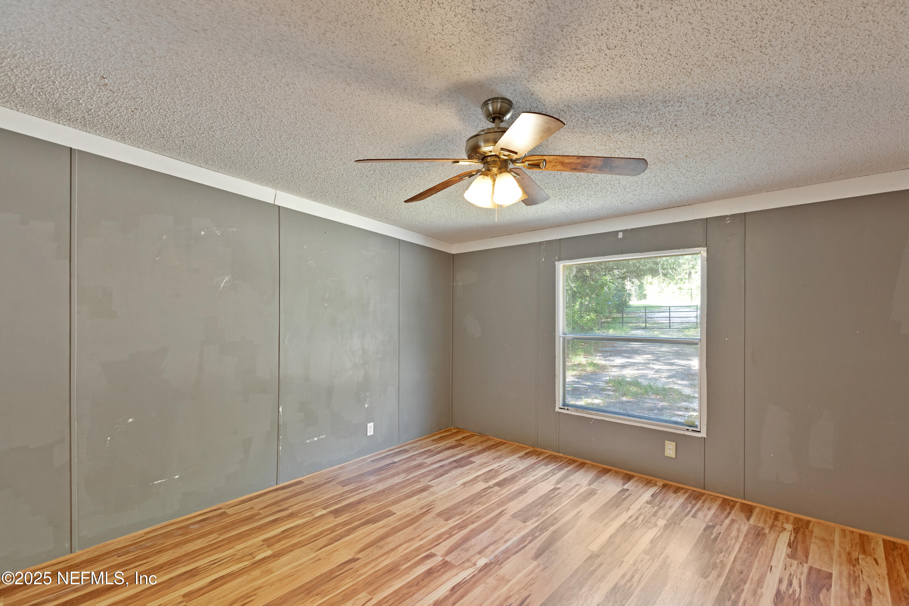 7463 Lilly Court Keystone Heights, FL 32656 - Photo 16 of 24 a view of an empty room with a window