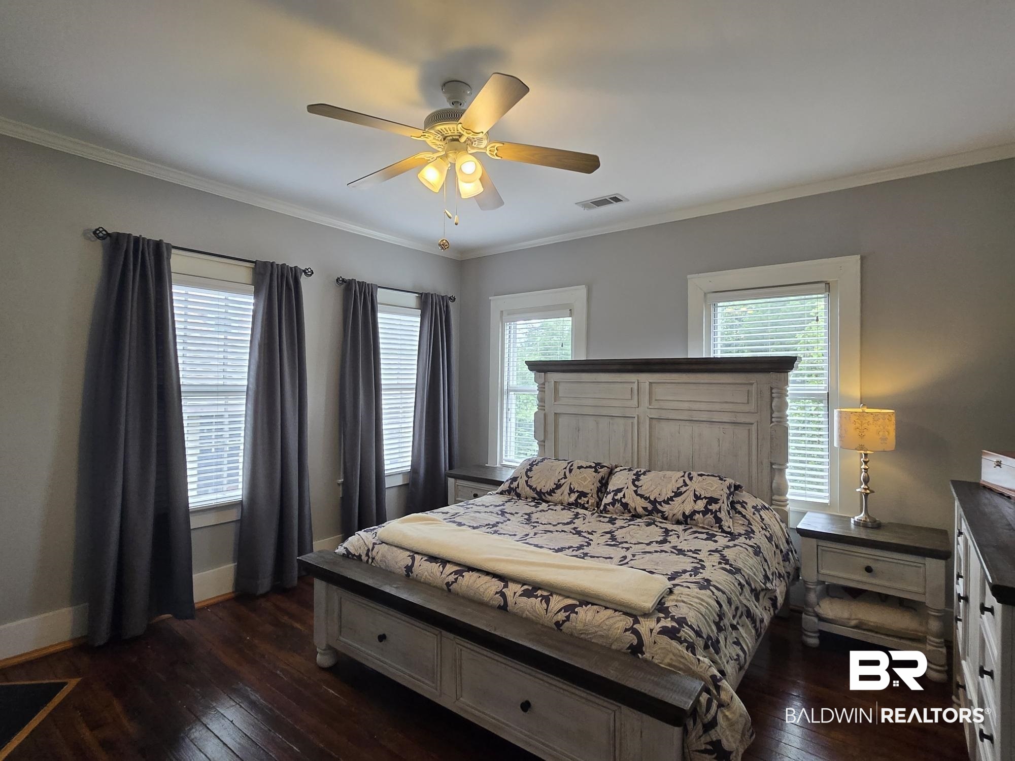 54 South Catherine Street Mobile, AL 36604 - Photo 32 of 55 Bedroom with dark wood-style floors, baseboards, ornamental molding, and a ceiling fan