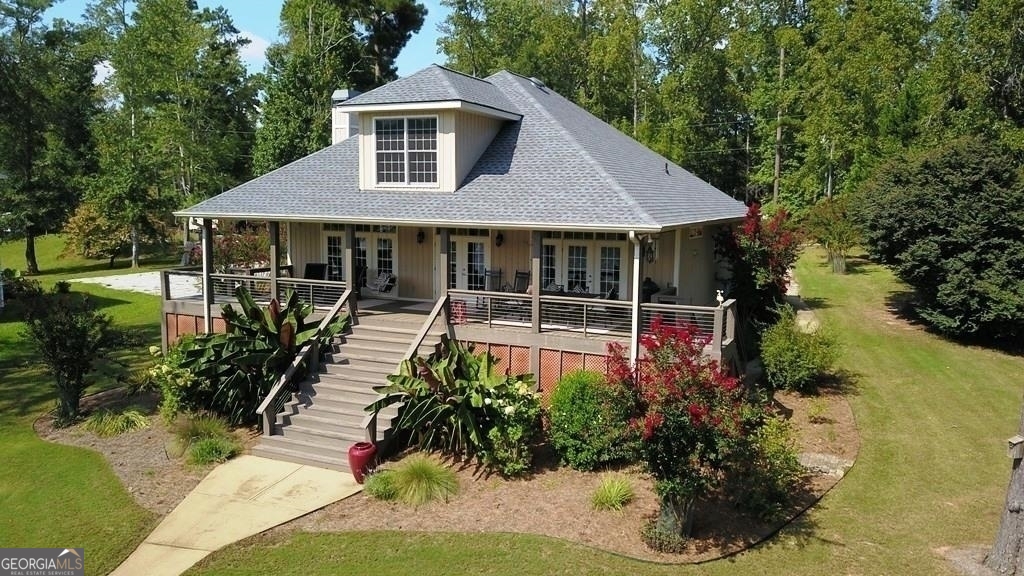 a house view with a garden space