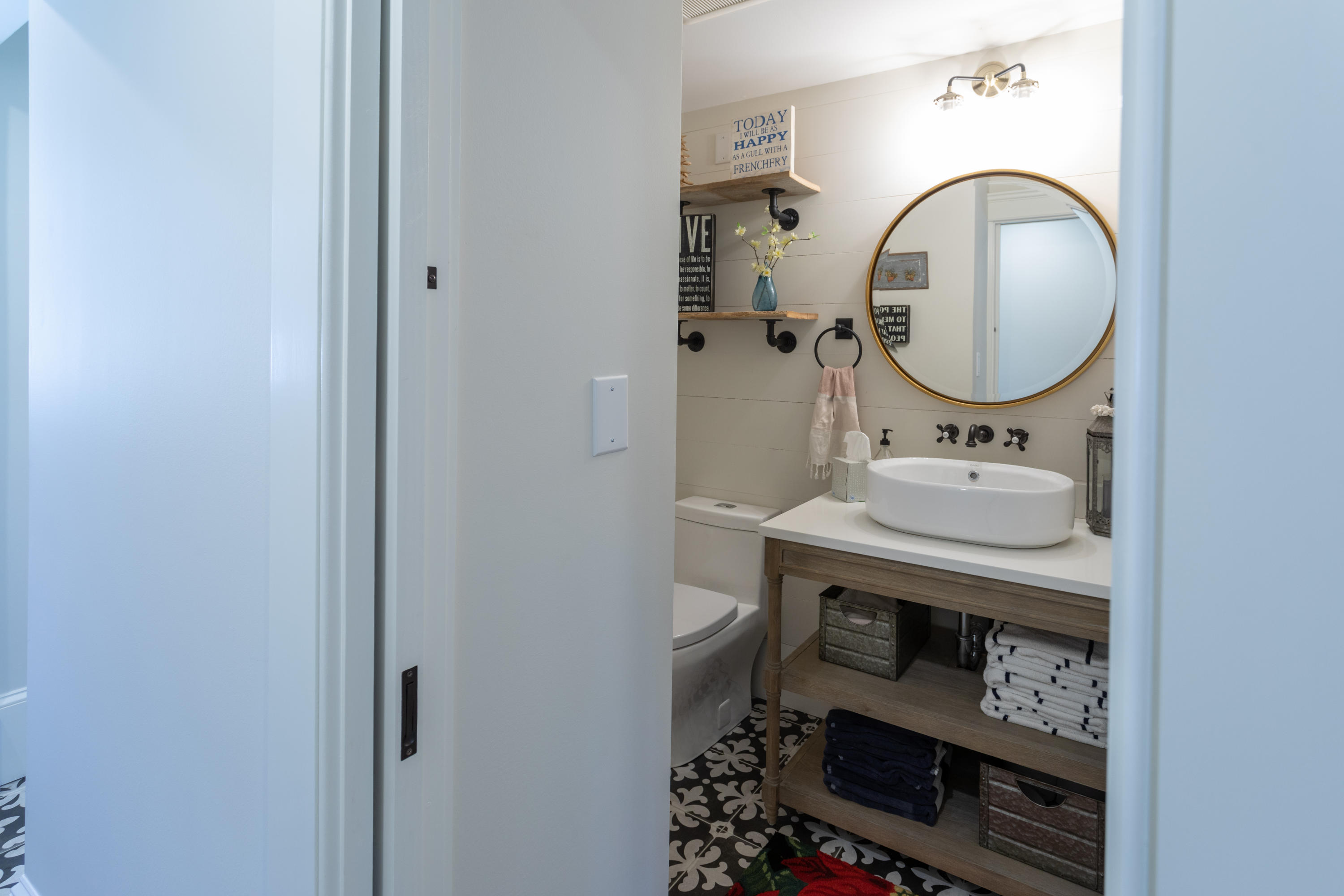 120 Smoke Valley Road Osterville, MA 02655 - Photo 17 of 64 a bathroom with a sink and a mirror