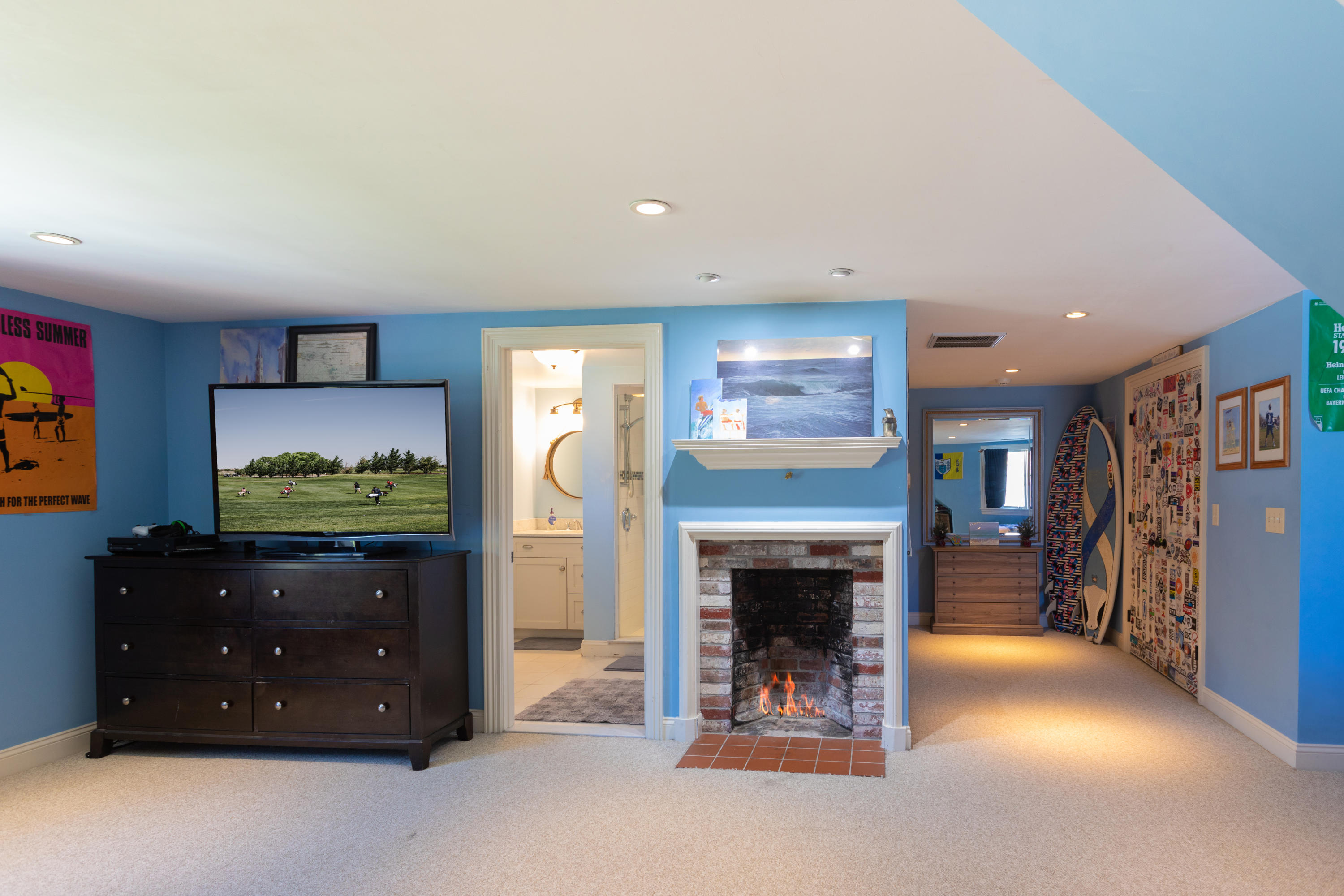 120 Smoke Valley Road Osterville, MA 02655 - Photo 30 of 64 a living room with furniture and a fireplace