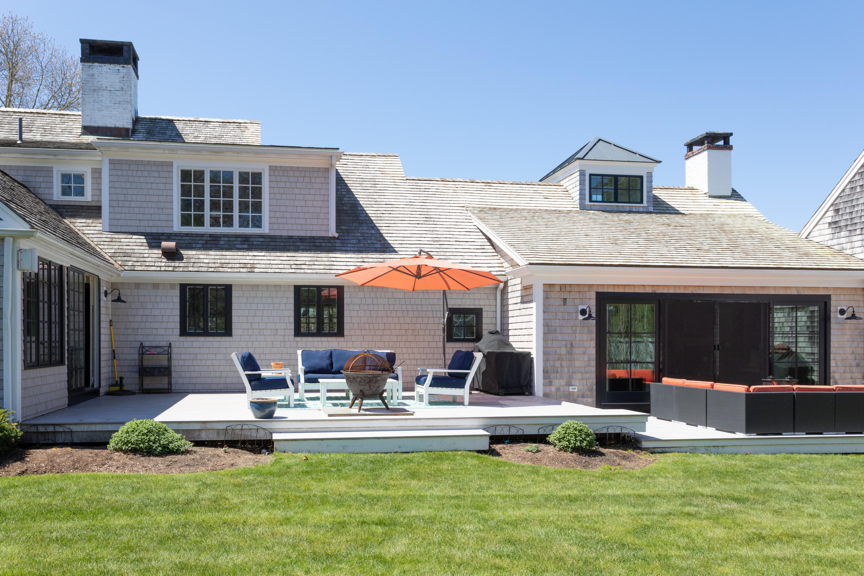 120 Smoke Valley Road Osterville, MA 02655 - Photo 42 of 64 a view of a house with furniture and garden