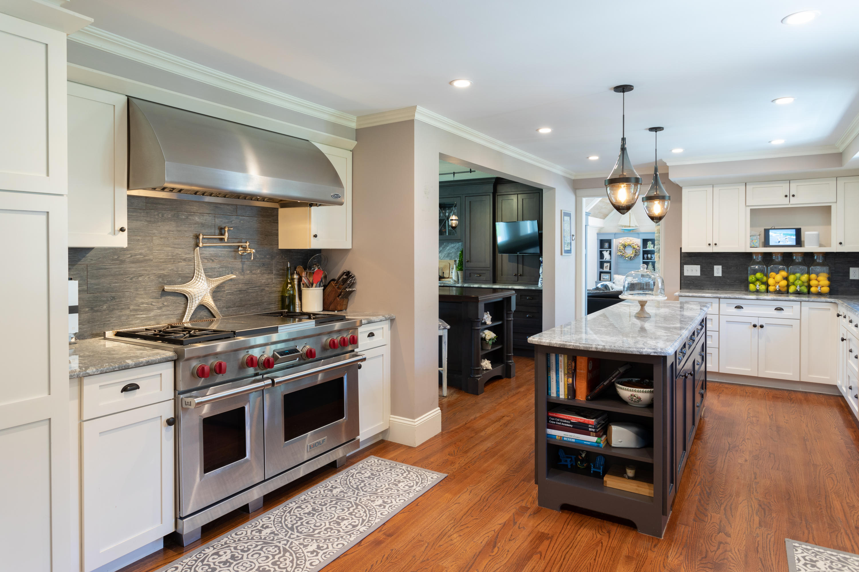 120 Smoke Valley Road Osterville, MA 02655 - Photo 5 of 64 a kitchen with a stove and a wooden floors