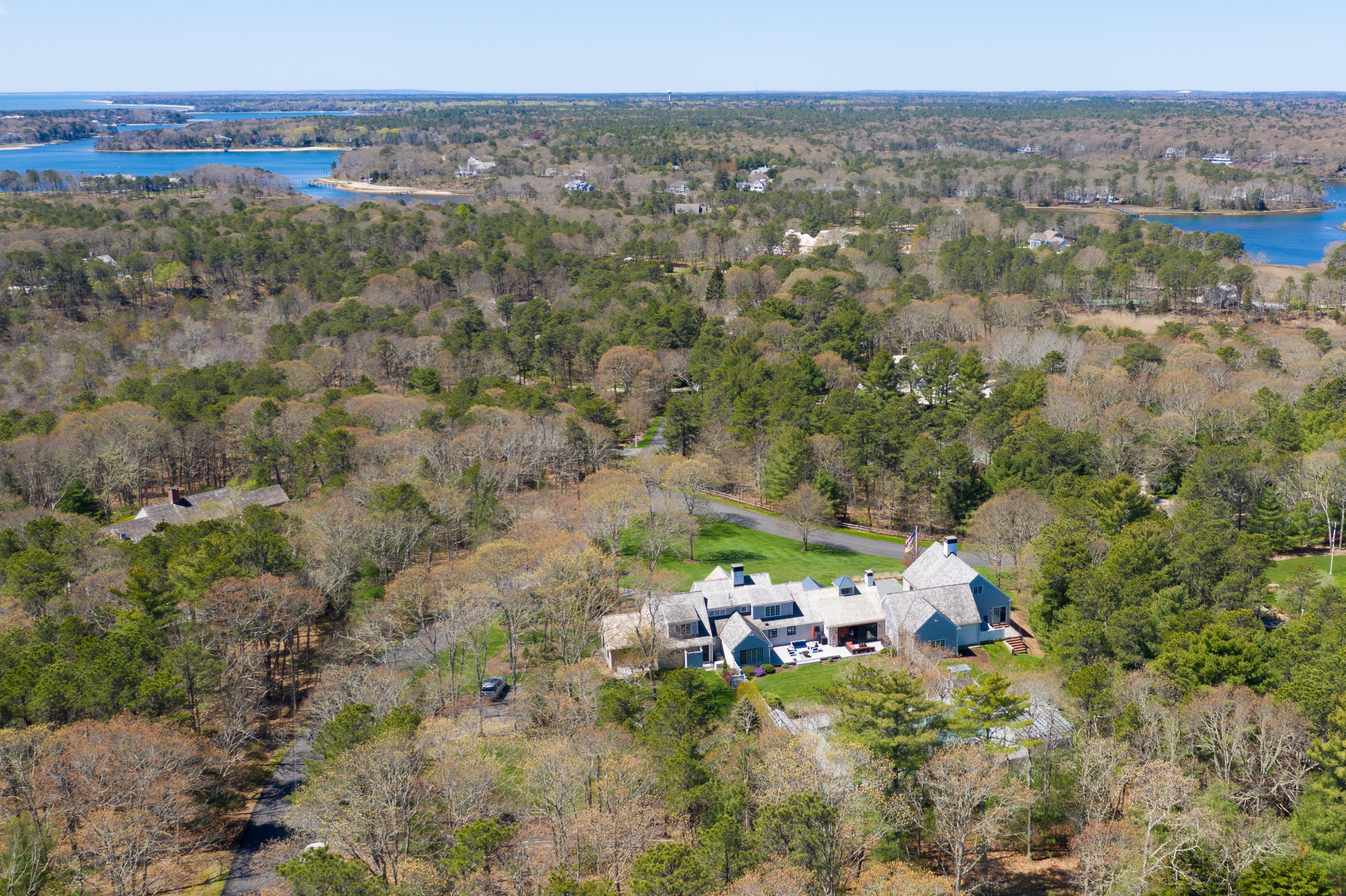 120 Smoke Valley Road Osterville, MA 02655 - Photo 58 of 64 an aerial view of a house with a yard