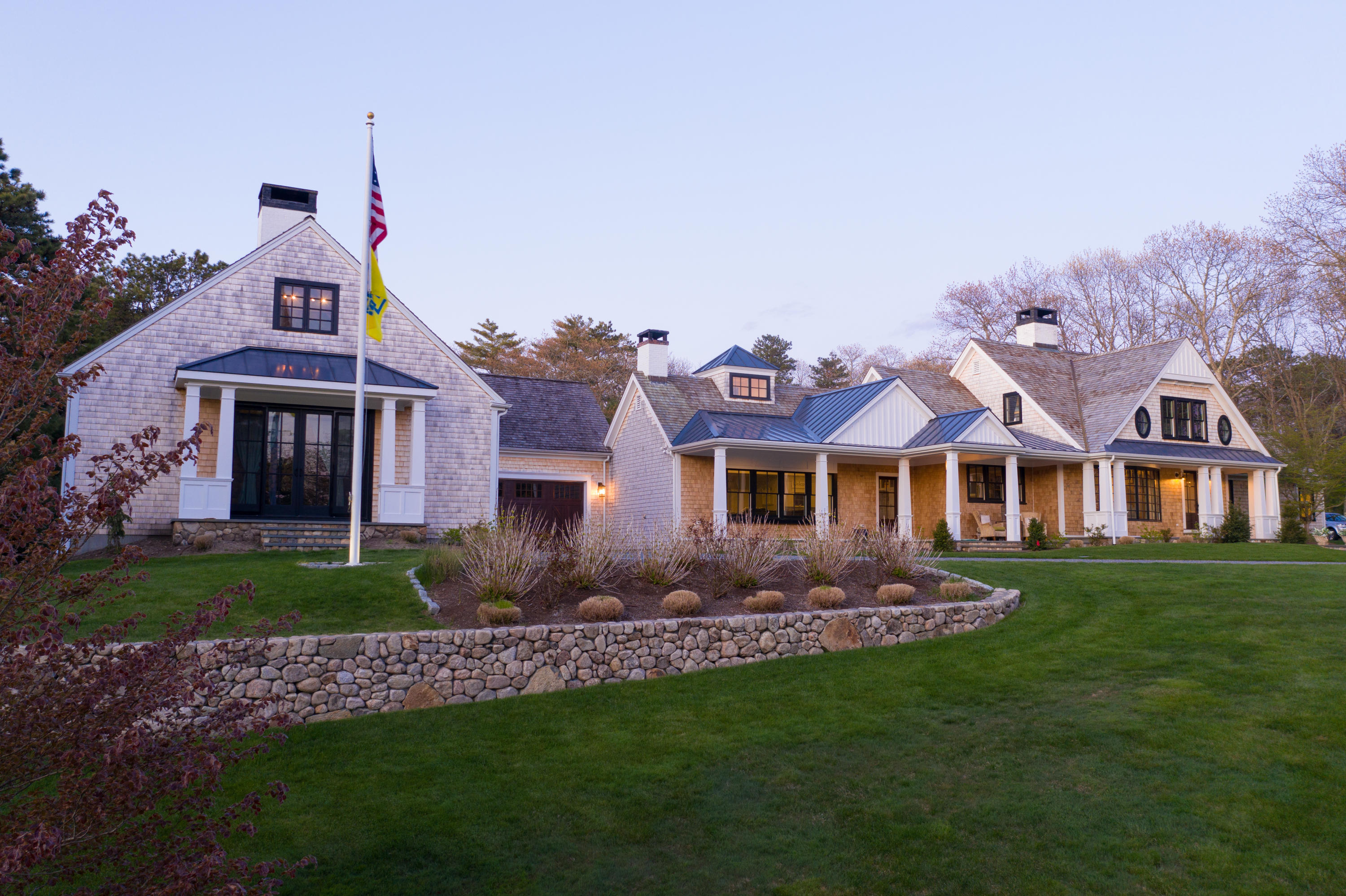 120 Smoke Valley Road Osterville, MA 02655 - Photo 60 of 64 a front view of a house with a garden