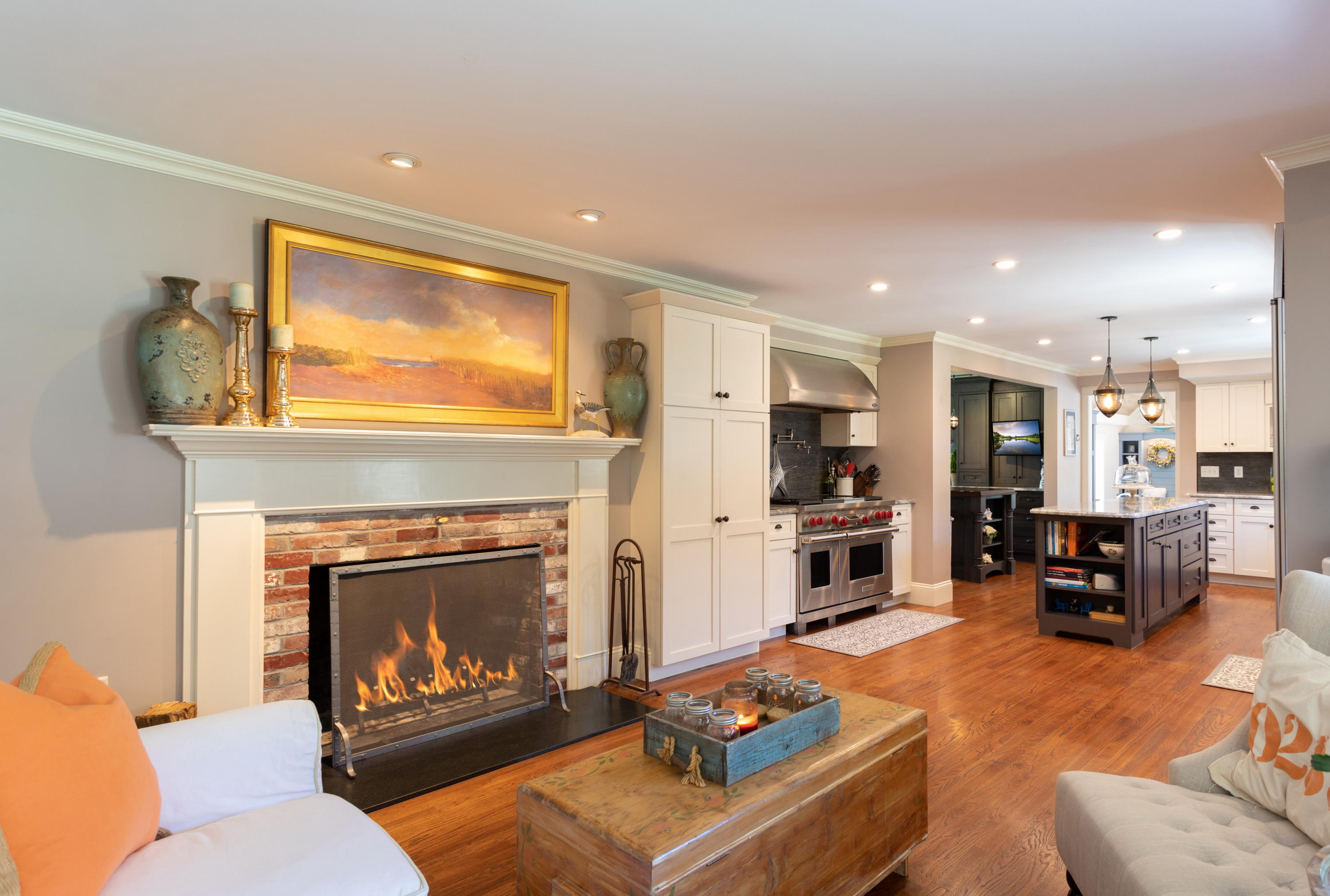 120 Smoke Valley Road Osterville, MA 02655 - Photo 10 of 64 a living room with furniture flat screen tv and a fireplace