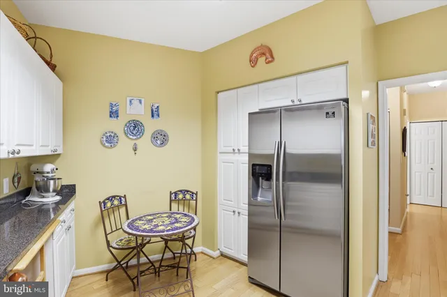 a room with a table and chairs