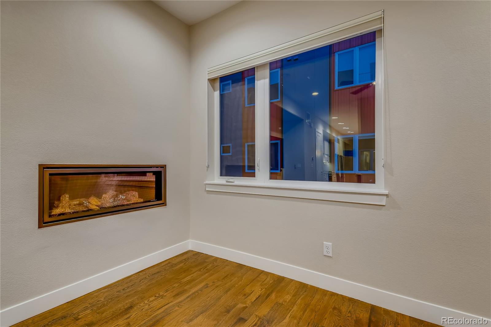 927 Inca Street, Unit 7 Denver, CO 80204 - Photo 20 of 38 a view of a room with wooden floor and cabinet