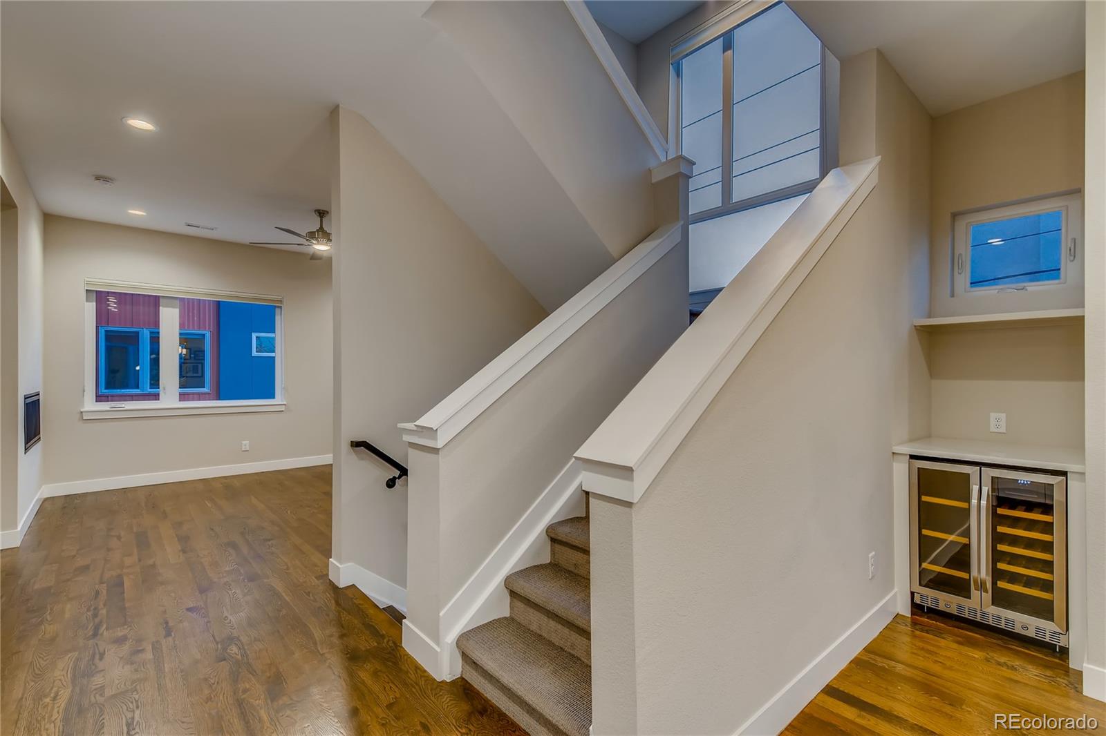 927 Inca Street, Unit 7 Denver, CO 80204 - Photo 23 of 38 a view of entryway and hall with wooden floor