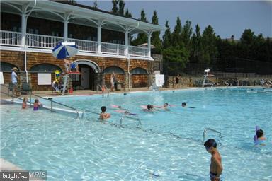123 Little Quarry Road Gaithersburg, MD 20878 - Photo 52 of 64 Kentlands social pool & clubhouse