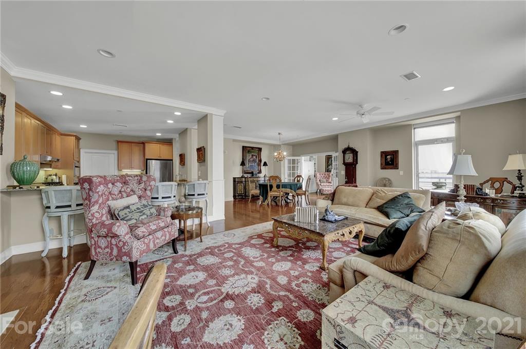 435 South Tryon Street, Unit 706 Charlotte, NC 28202 - Photo 25 of 40 a living room with furniture and a couch