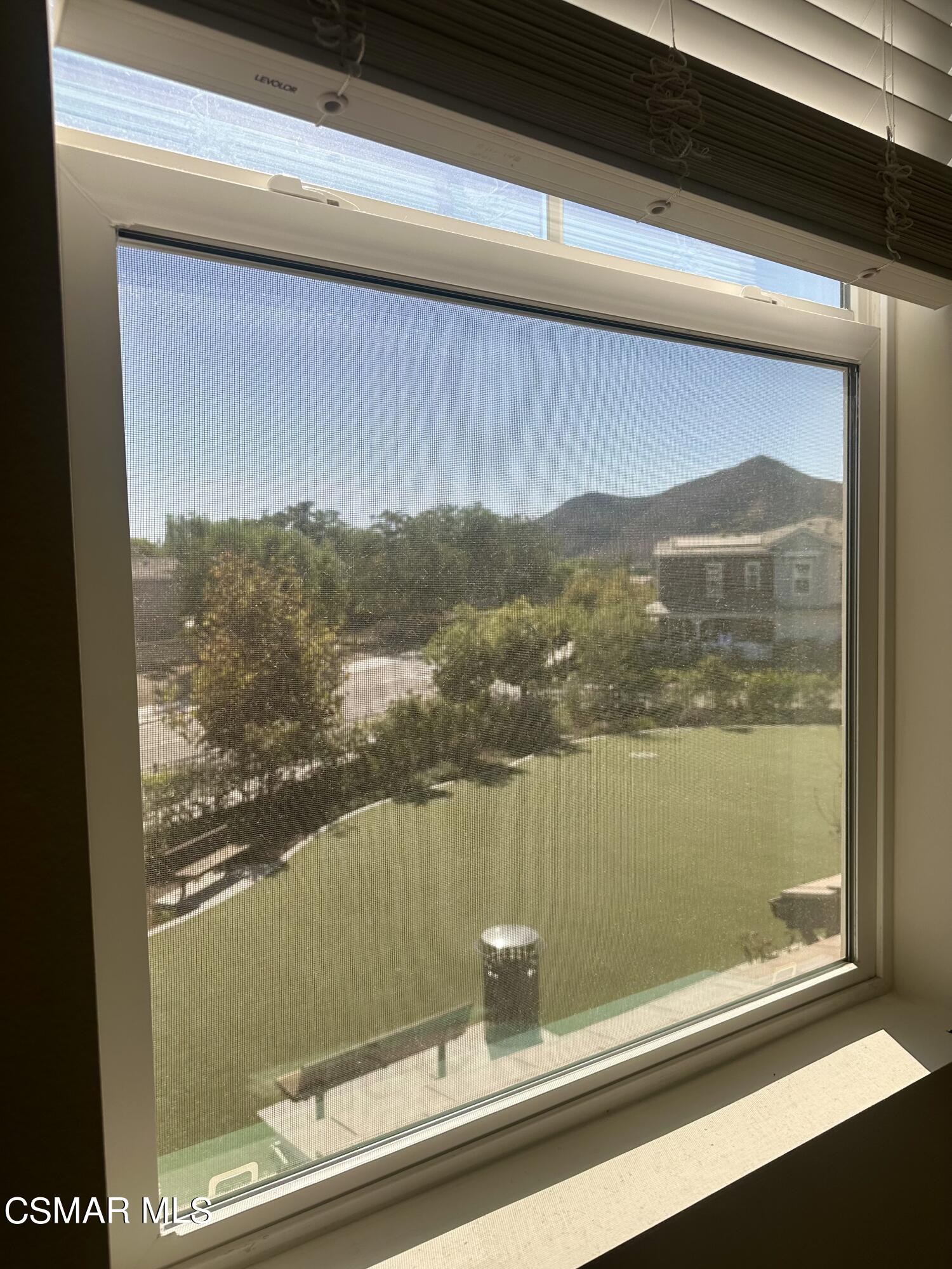 300 Farmhouse Drive, Unit 4 Simi Valley, CA 93065 - Photo 12 of 22 a view of a lake from a window