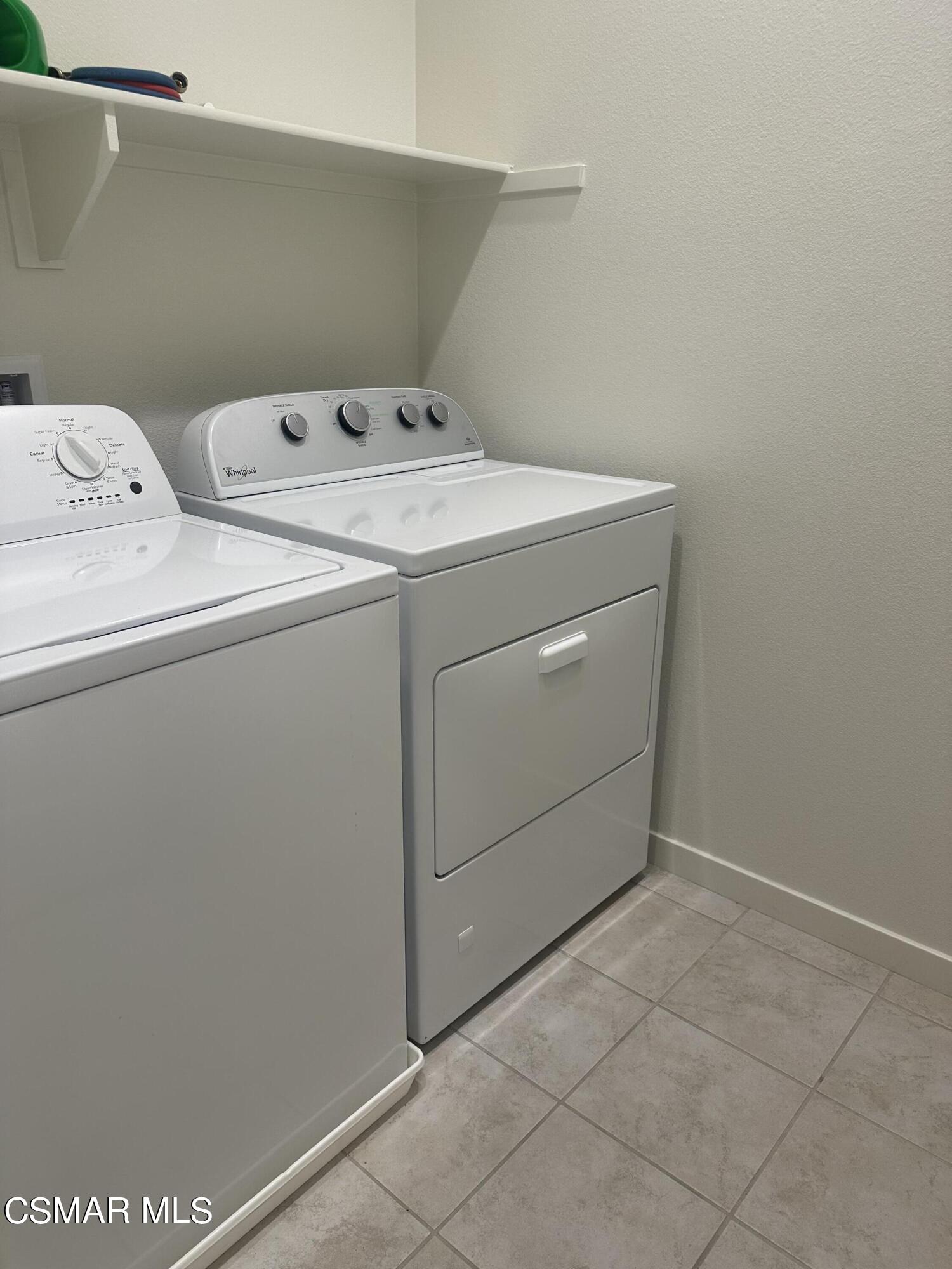 300 Farmhouse Drive, Unit 4 Simi Valley, CA 93065 - Photo 16 of 22 a utility room with dryer and washer