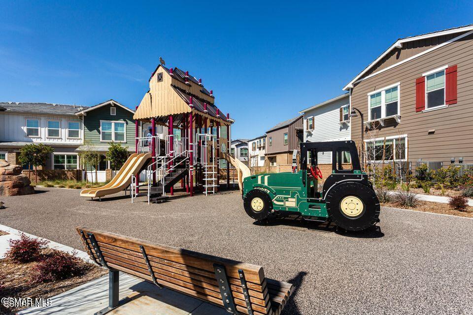 300 Farmhouse Drive, Unit 4 Simi Valley, CA 93065 - Photo 19 of 22 a car parked in front of a house