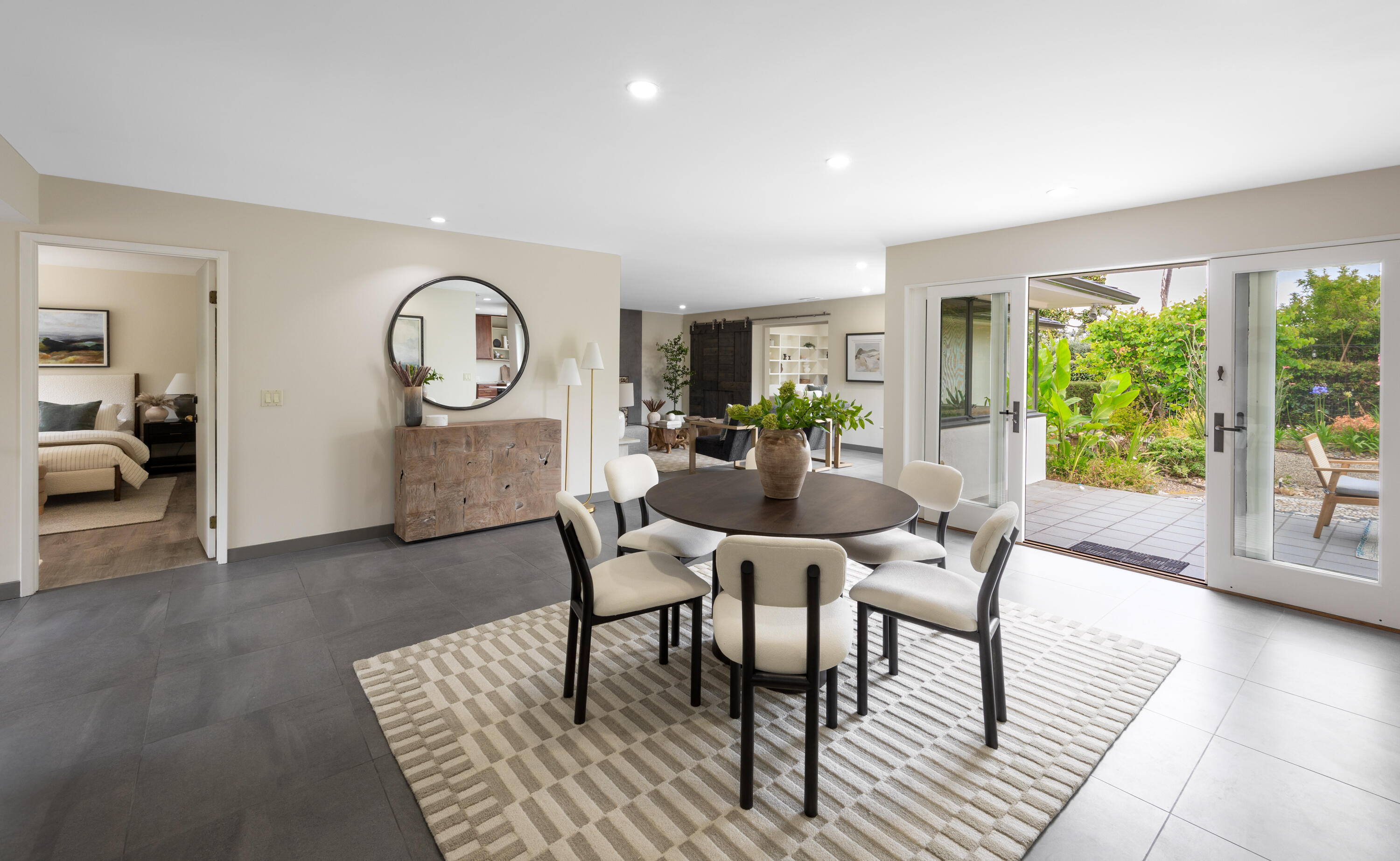 4 El Arco Drive Santa Barbara, CA 93105 - Photo 3 of 26 a view of a dining room with furniture window and wooden floor