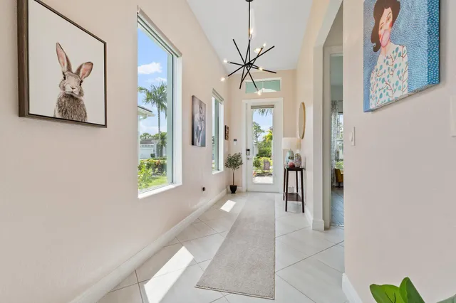 a kitchen with a stove a sink and a refrigerator
