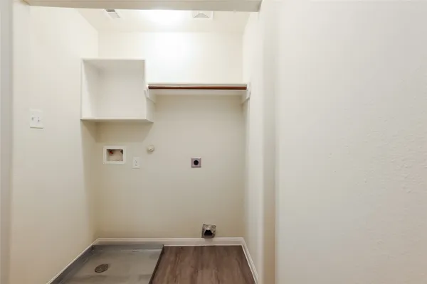 a view of small space with racks on the wall