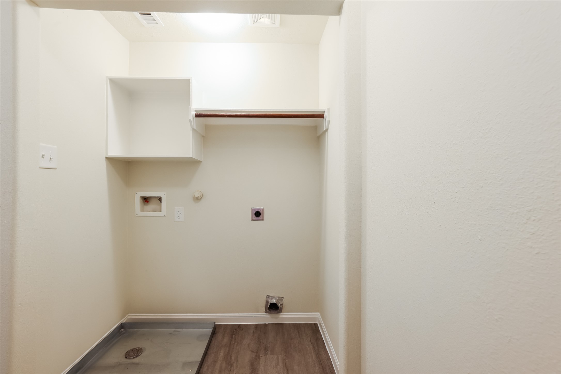 12431 Roy Mix Bohn Lane Houston, TX 77044 - Photo 12 of 13 a view of small space with racks on the wall