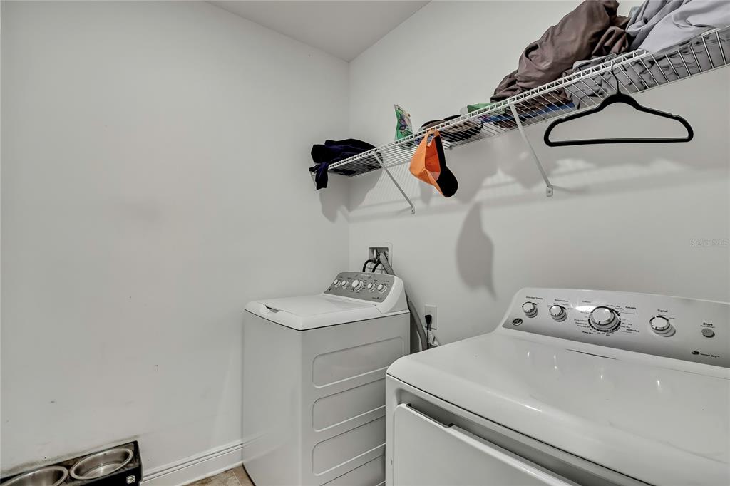 16197 Medrick Road Weeki Wachee, FL 34614 - Photo 14 of 22 a utility room with dryer and washer