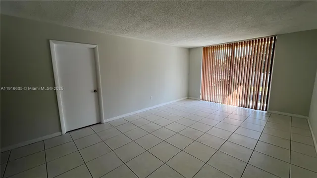 a view of balcony with furniture
