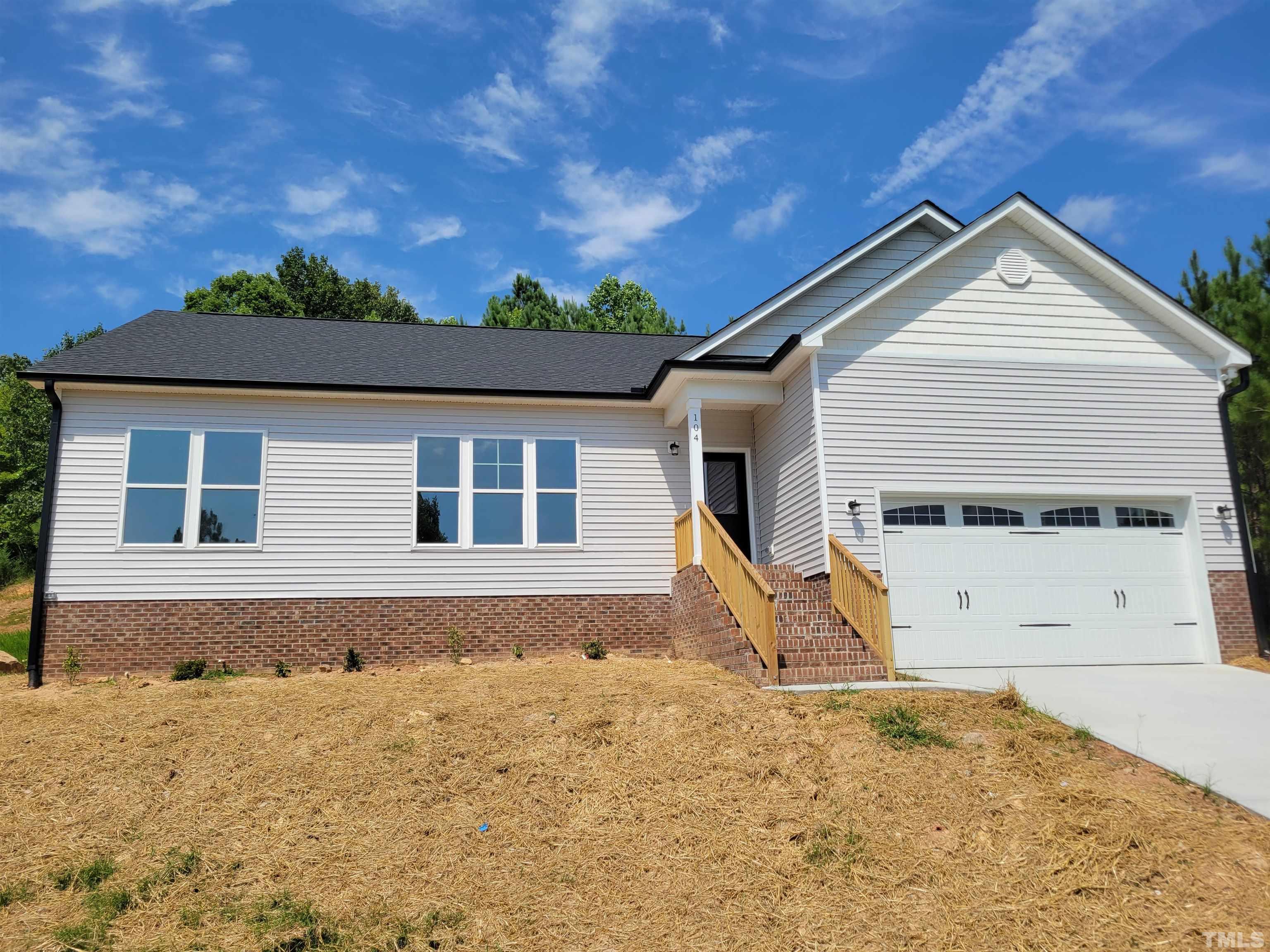 104 Glasgow Street Stem, NC 27581 - Photo 1 of 21 a view of a house with a yard