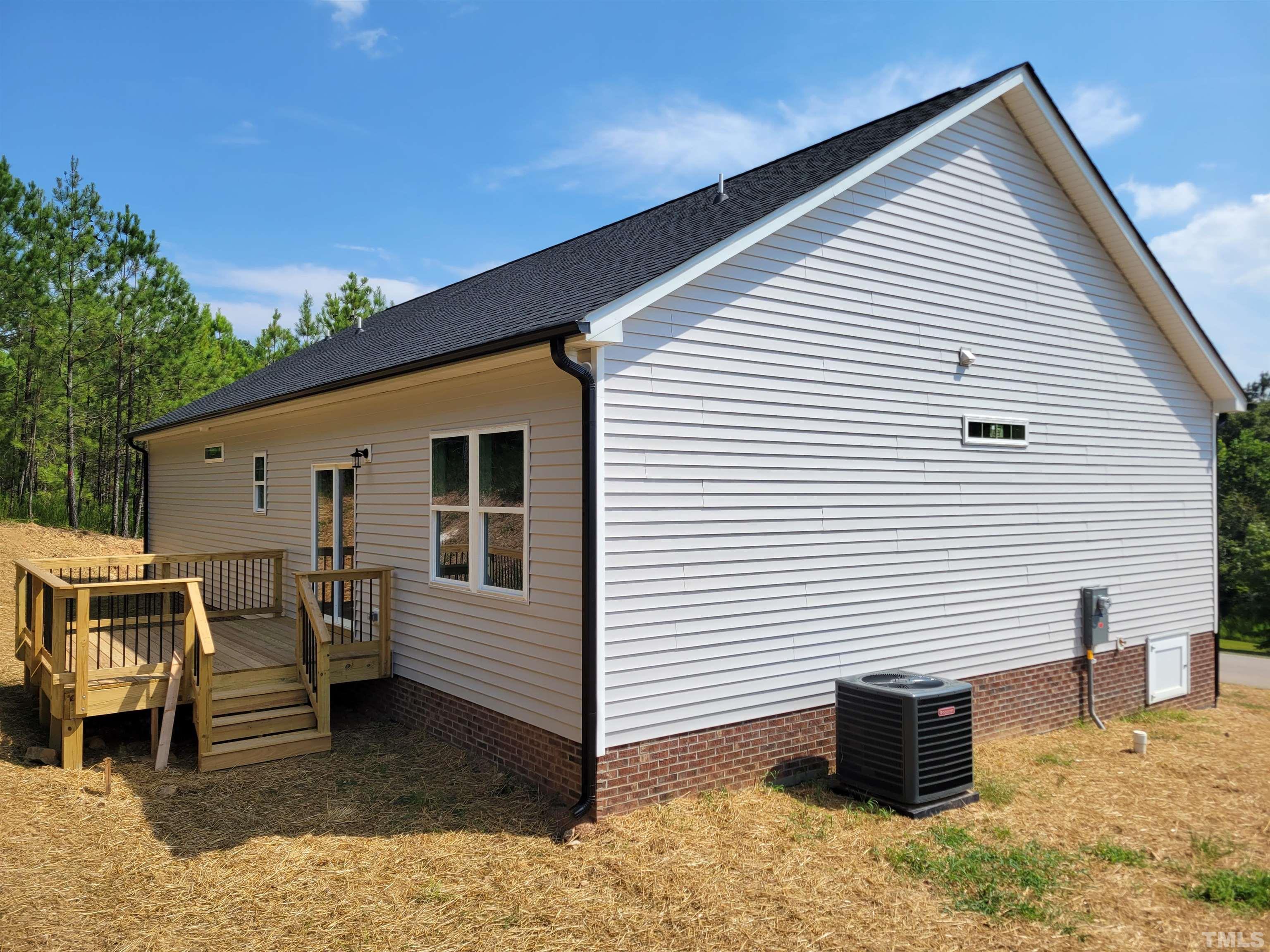 104 Glasgow Street Stem, NC 27581 - Photo 20 of 21 a view of a house with backyard