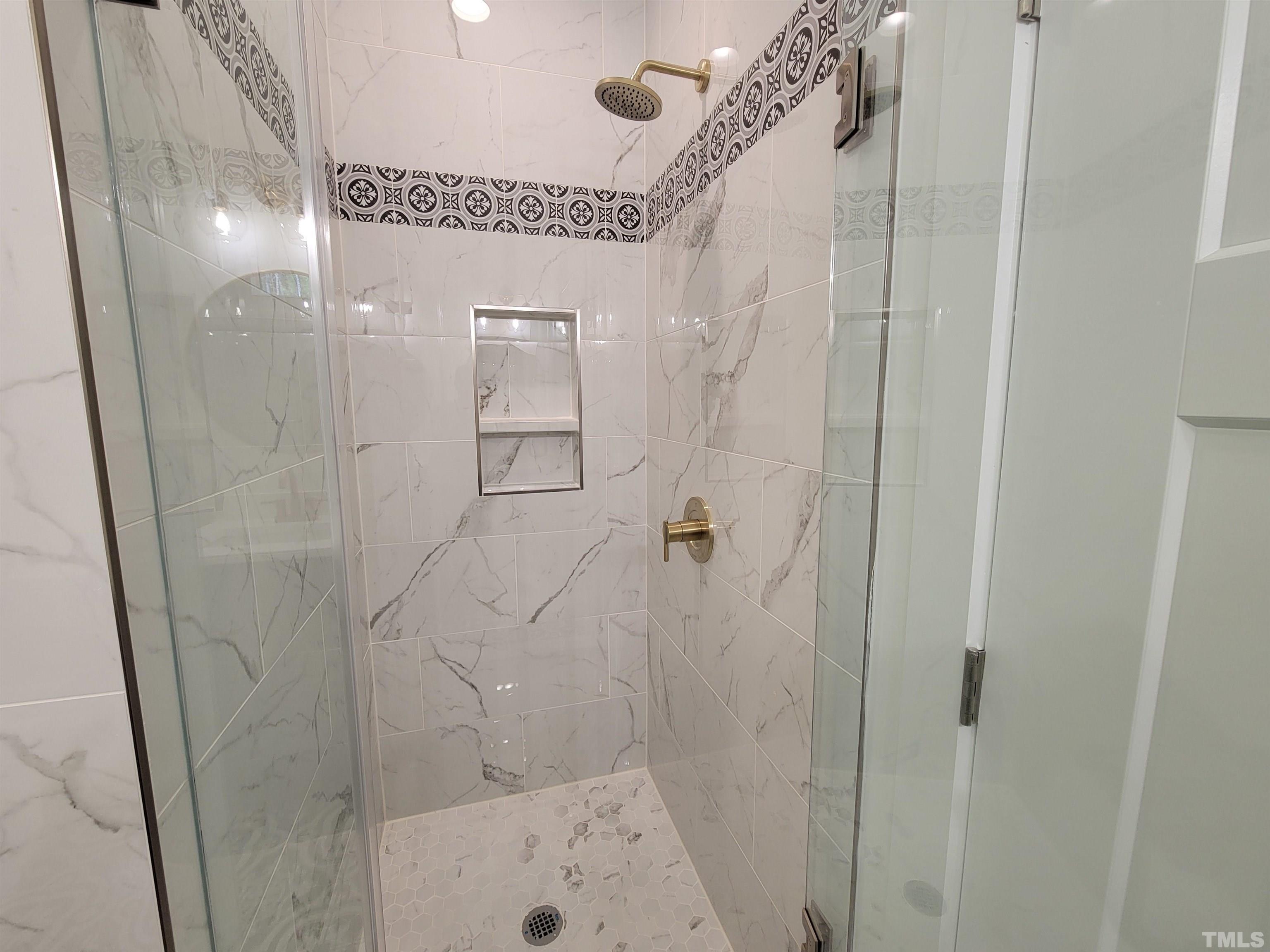 104 Glasgow Street Stem, NC 27581 - Photo 2 of 21 a bathroom with a shower and a sink